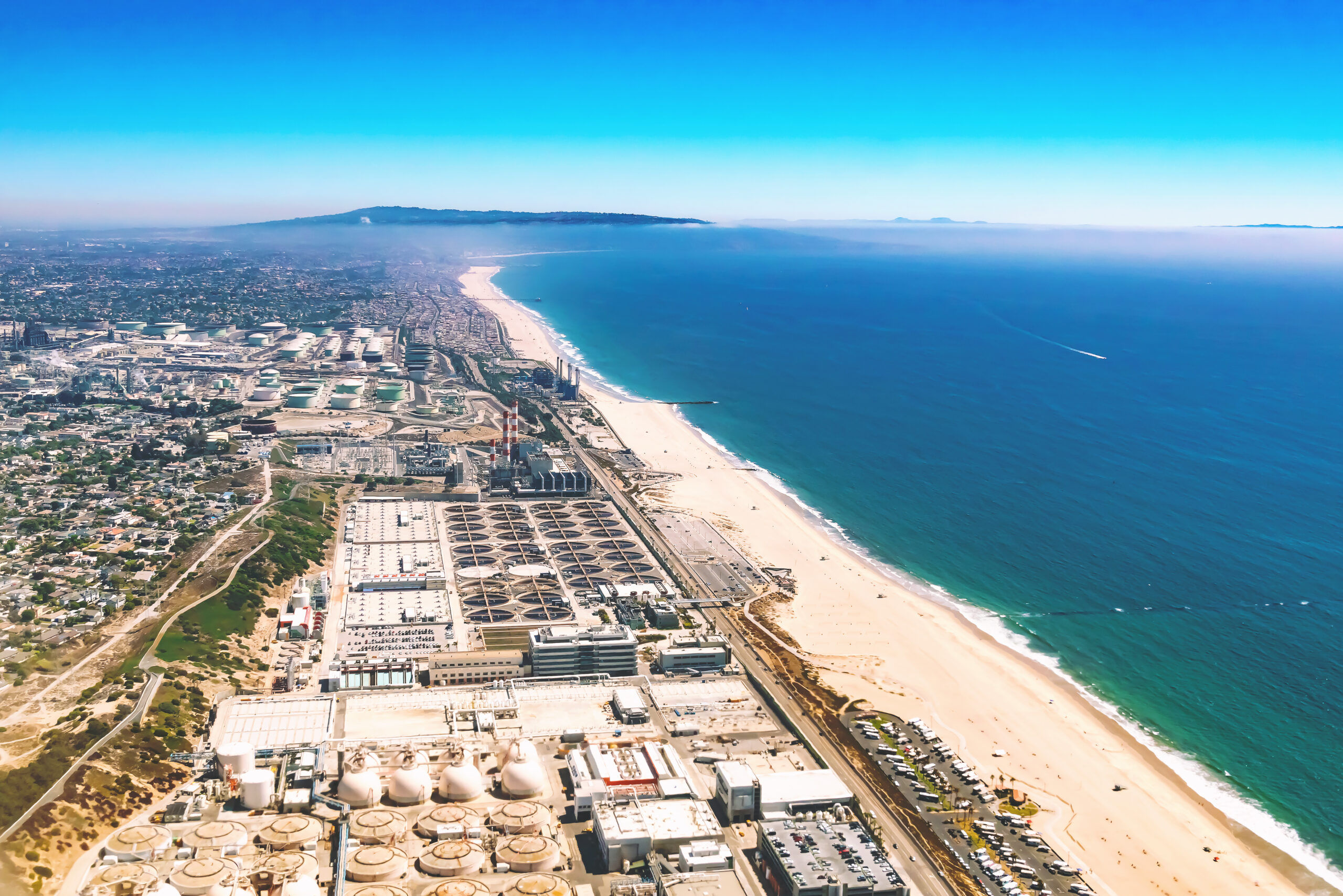Aerial view of an oil refinery on the beach of El Segundo, Los Angeles, CA