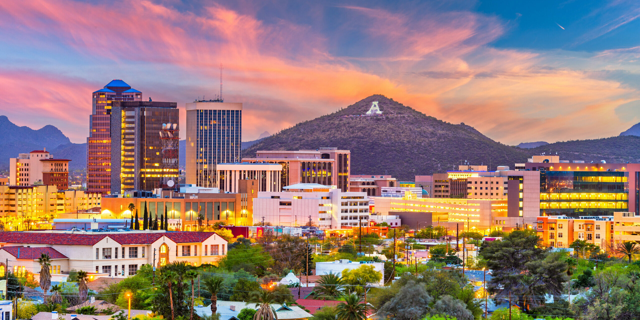 Tucson, Arizona, USA downtown skyline with Sentinel Peak at dusk. (Mountaintop "A"  for "Arizona")